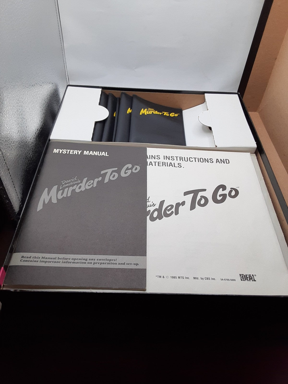 IDEAL David Landau's Murder to Go The Murder Mystery Participation Game